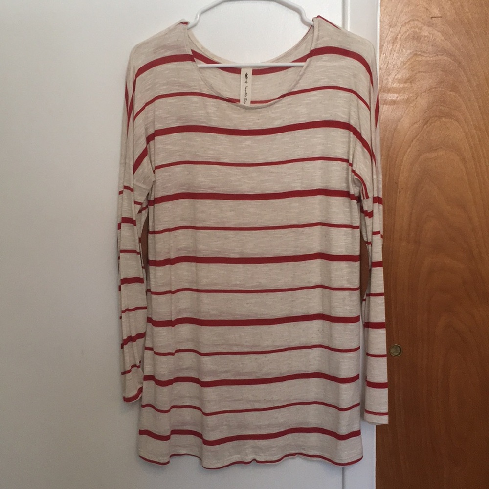 Striped top with elbow pads.